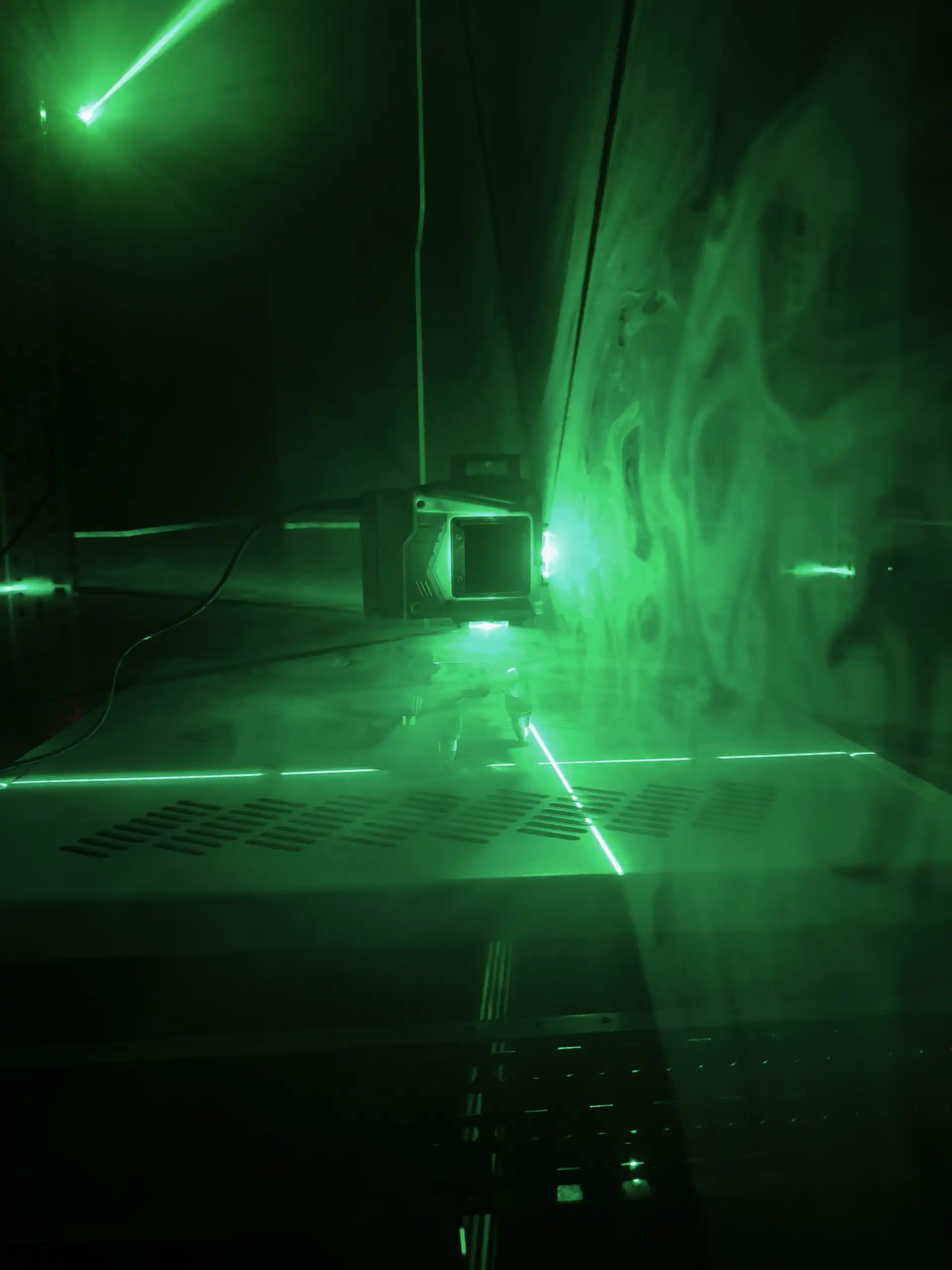 Grüne Laser und Rauch 