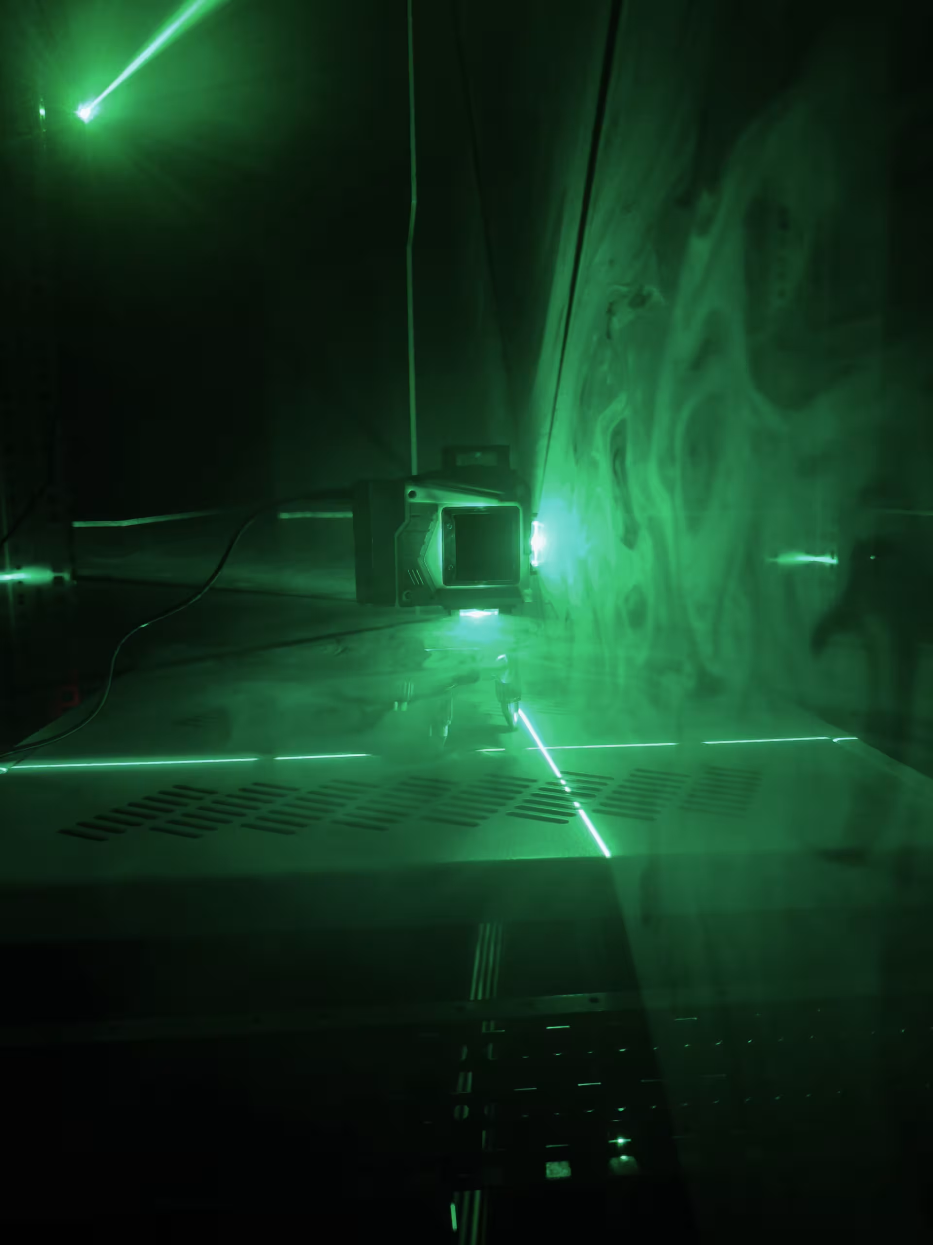 Grüne Laser und Rauch 